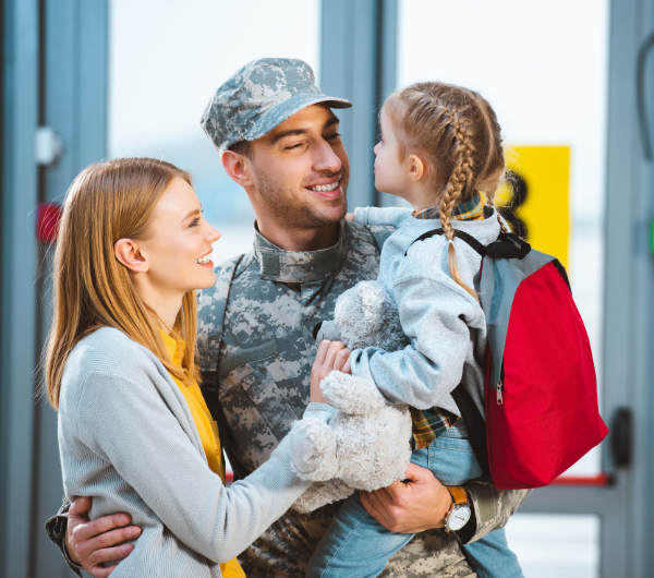 military family embracing